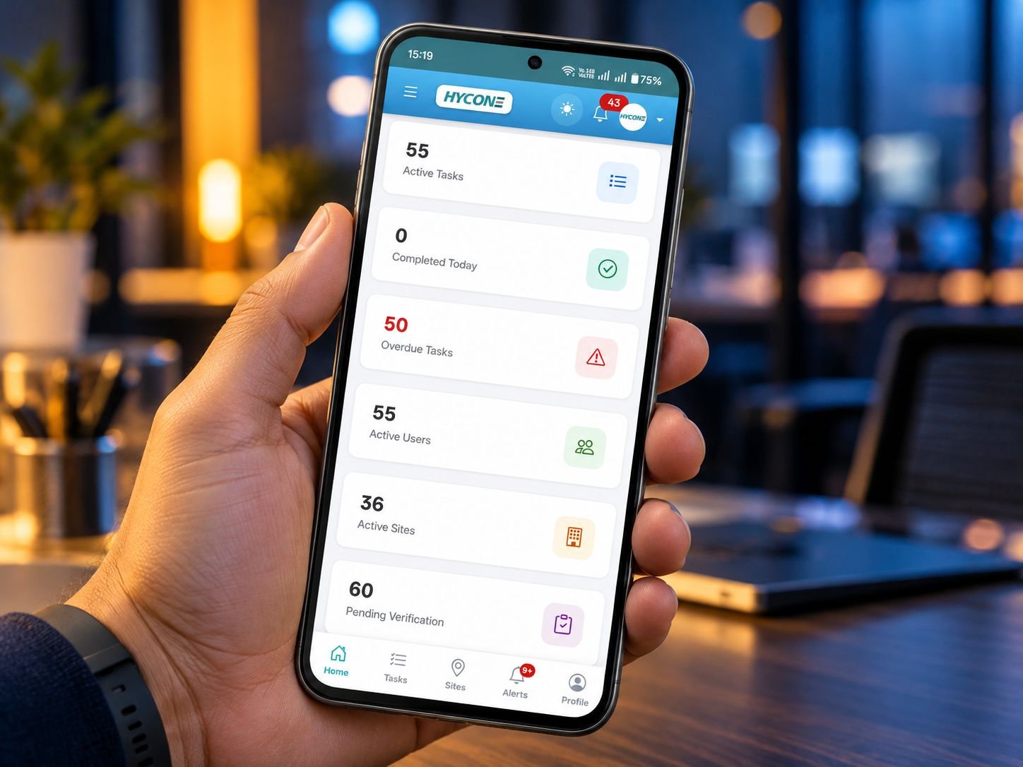 Hycone Task Tracker mobile dashboard on a smartphone